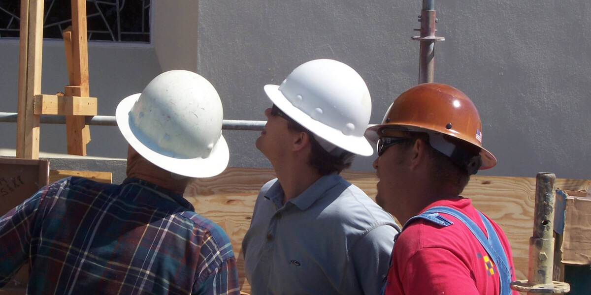 construction workers inspecting their work